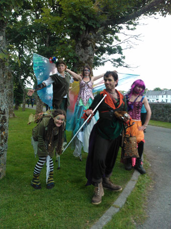 stilt walkers, faerys elves and pixies