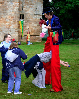 balloon modeller fire performer and stilt walke