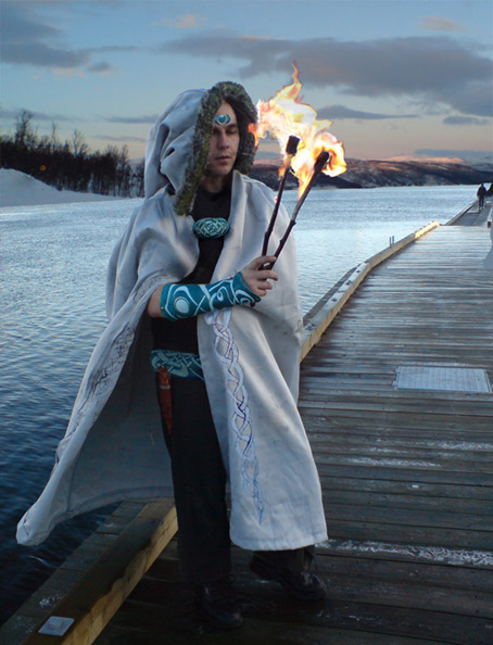 fire performer in period norse costume